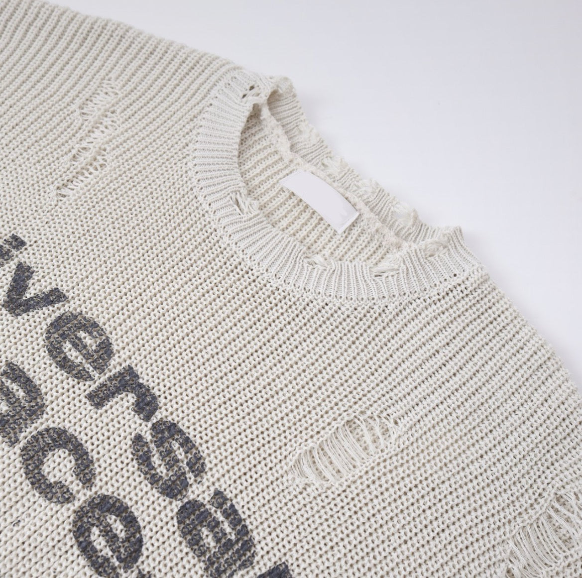 Damaged Universal Knit Top