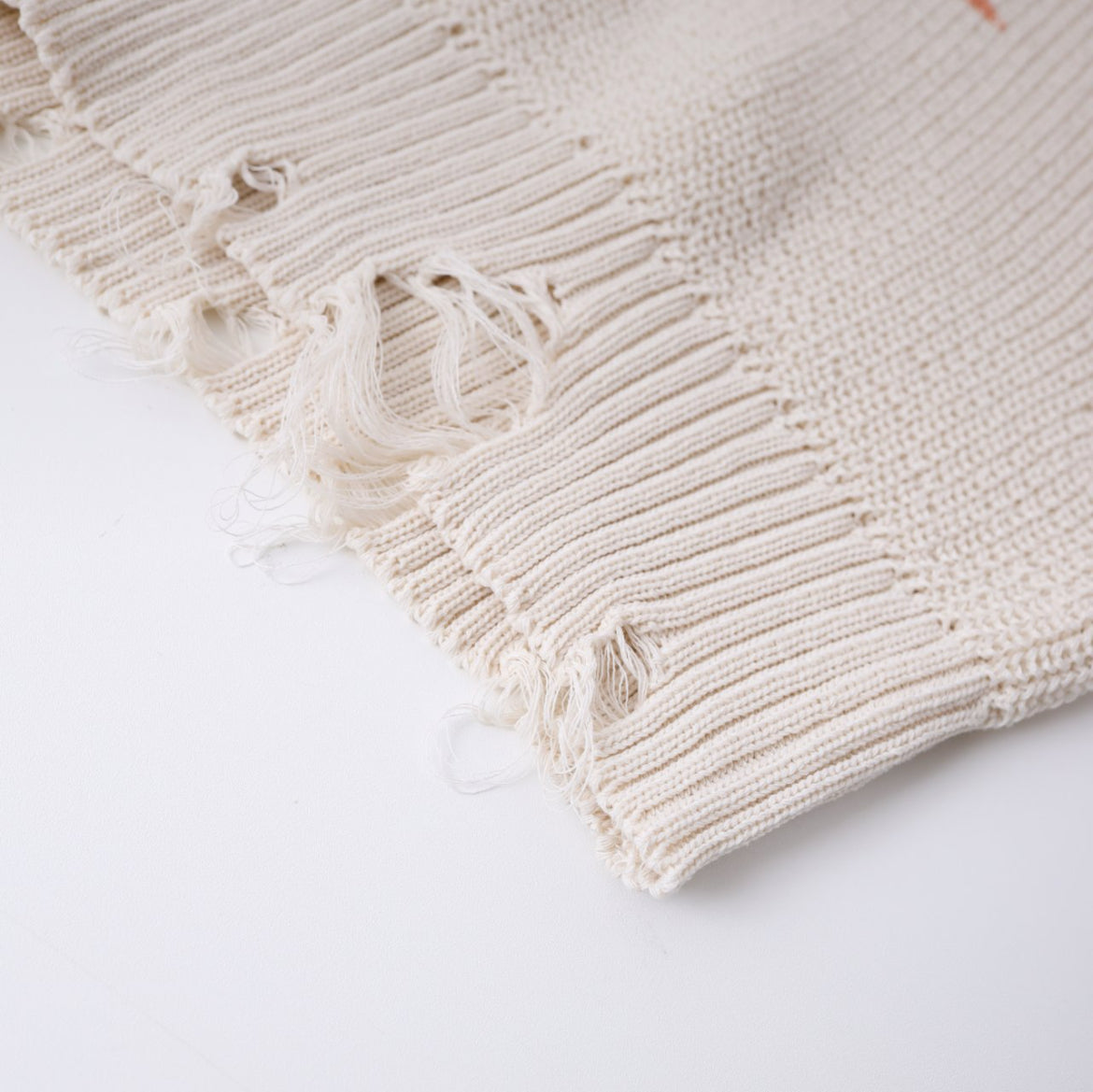 Damaged Universal Knit Top
